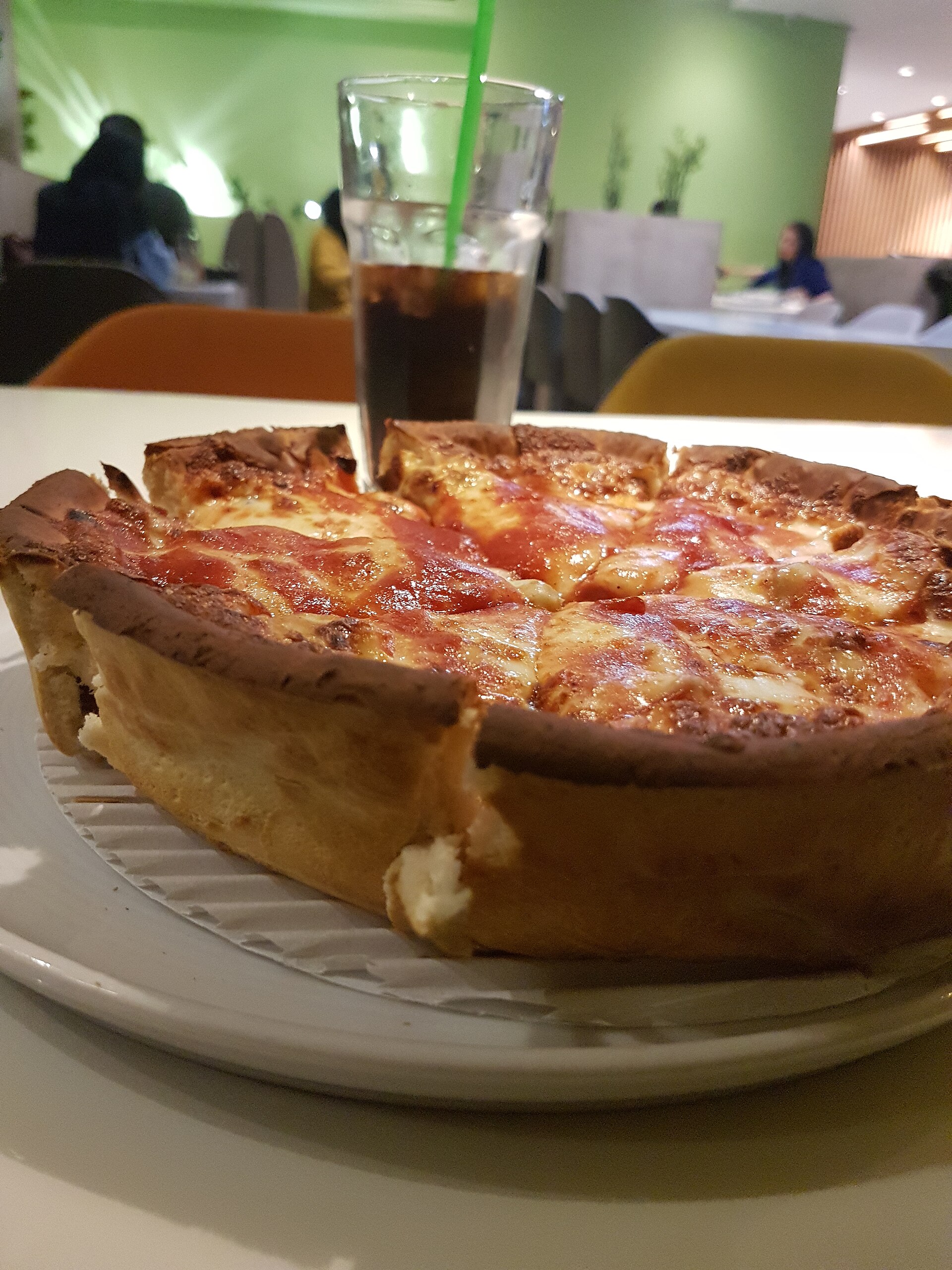 Chicago deep dish pizza in a cast iron pan